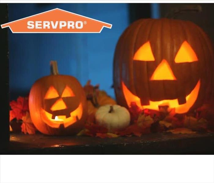 Glowing jack-o-lanterns with SERVPRO logo