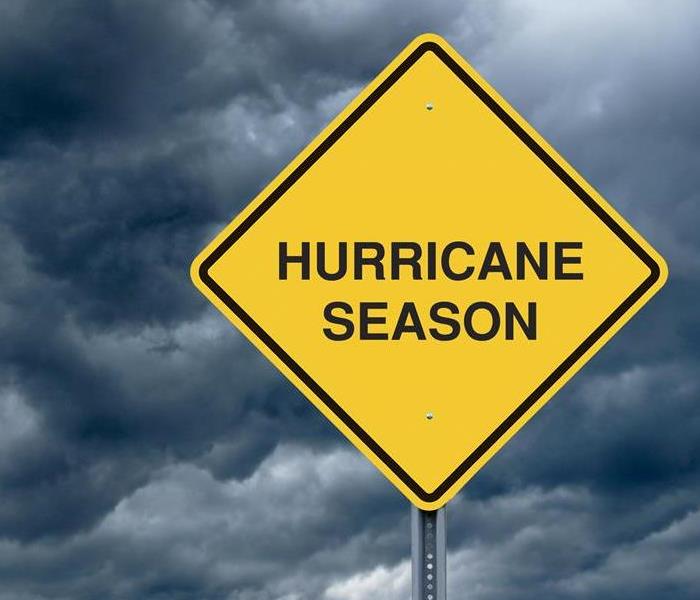 Hurricane Season sign on a stormy background