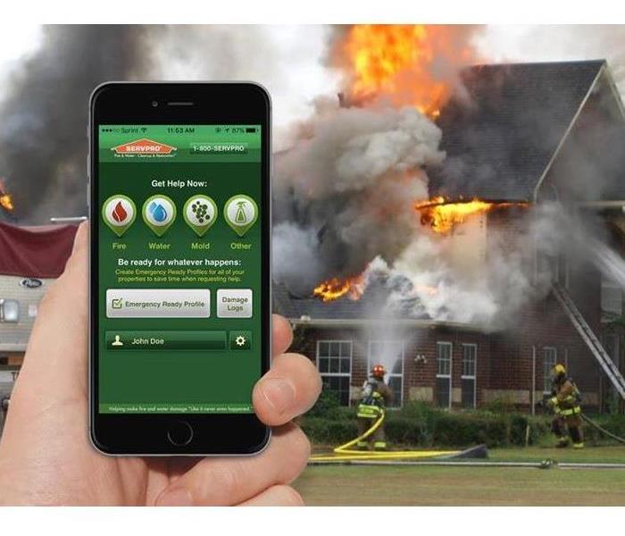 House on fire with ERP app opened on a phone screen